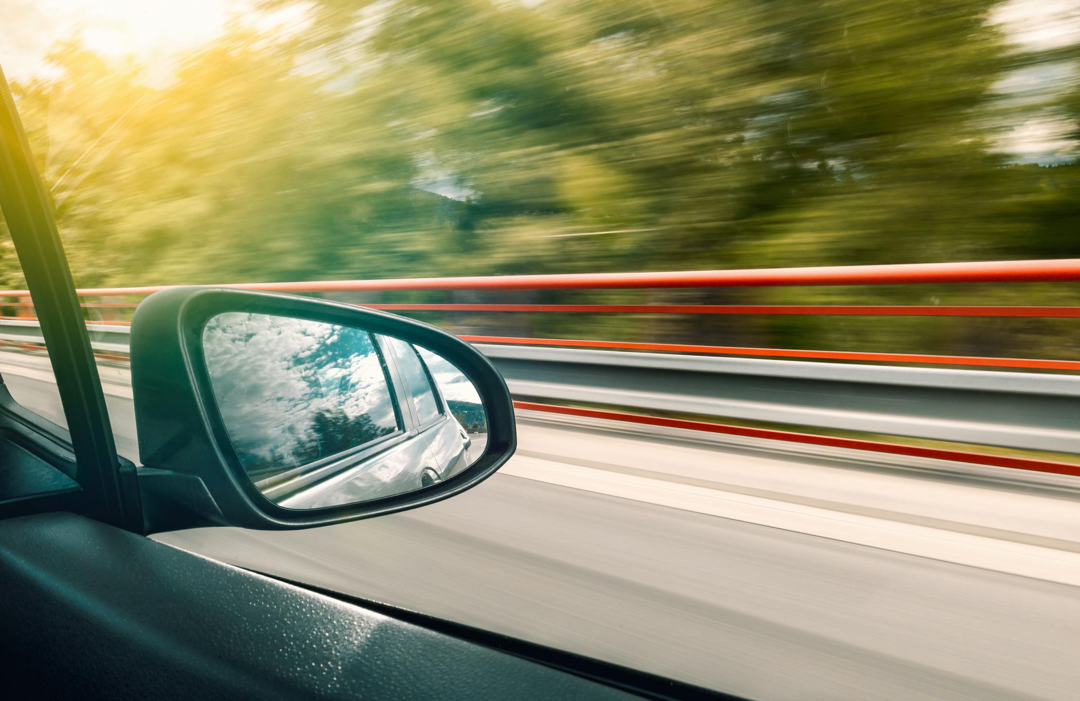 A sports car on an open road
